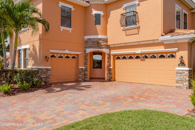 view of front of home with a garage