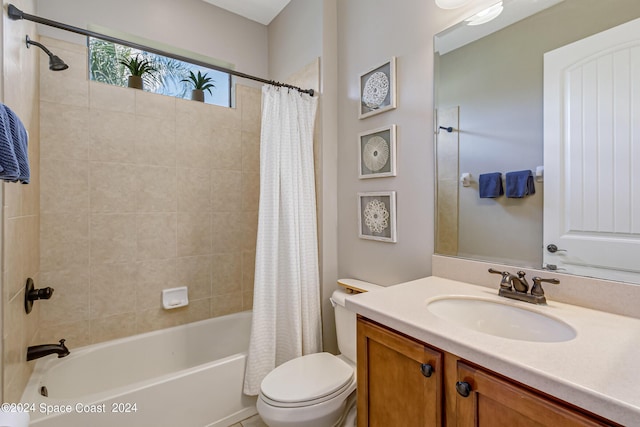 full bathroom featuring shower / bath combination with curtain, toilet, and vanity