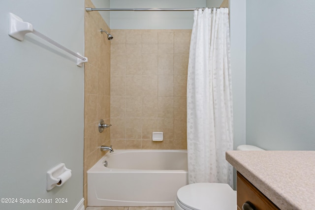 full bathroom with toilet, vanity, and shower / tub combo with curtain