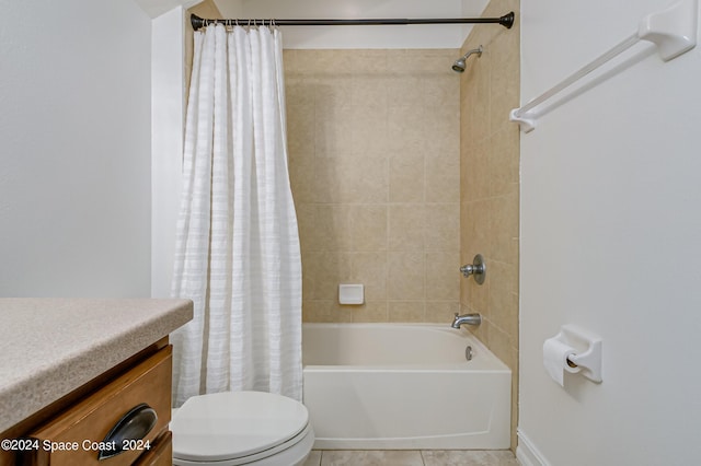 full bathroom featuring tile patterned flooring, shower / bath combination with curtain, vanity, and toilet