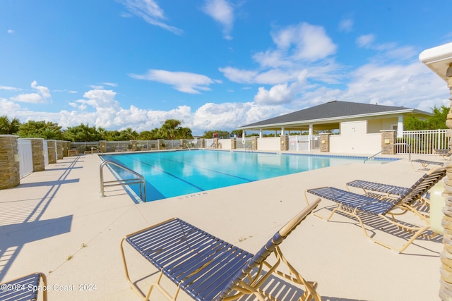 view of pool with a patio