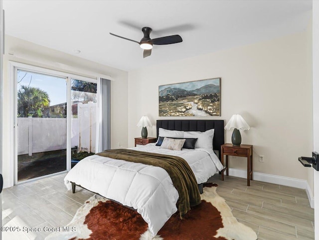 bedroom featuring ceiling fan and access to exterior