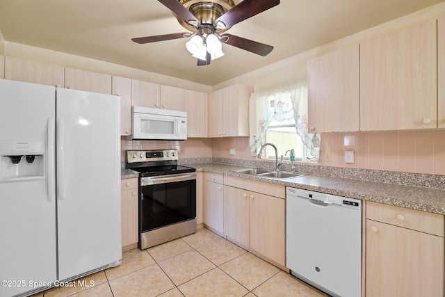 kitchen featuring light brown cabinets, white appliances, sink, ceiling fan, and light tile patterned floors