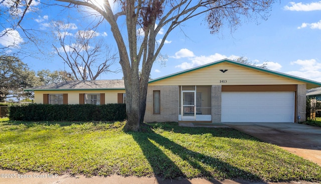 ranch-style home with a garage and a front lawn