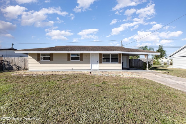 ranch-style house with a front yard and a carport