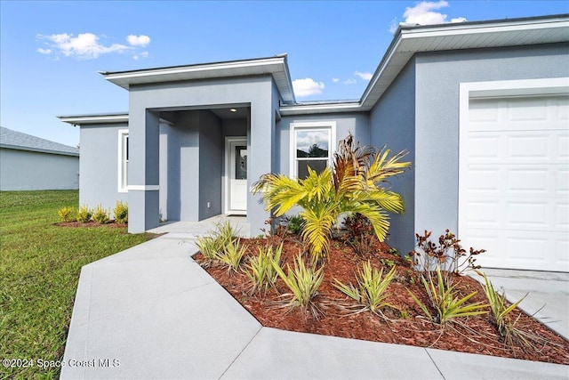 entrance to property with a garage