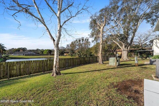 view of yard with a water view