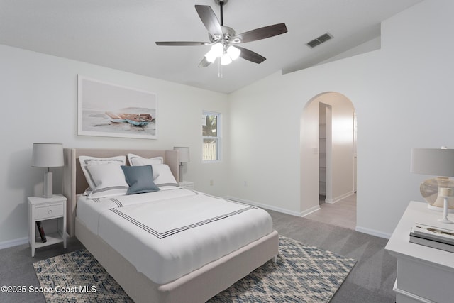 bedroom featuring ceiling fan, carpet floors, and lofted ceiling