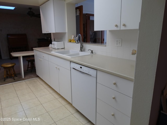 kitchen with dishwasher, white cabinets, ceiling fan, and sink