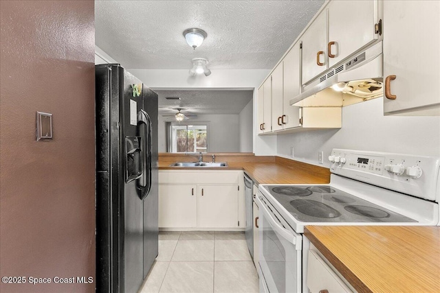 kitchen with black refrigerator with ice dispenser, sink, light tile patterned floors, white electric stove, and white cabinetry