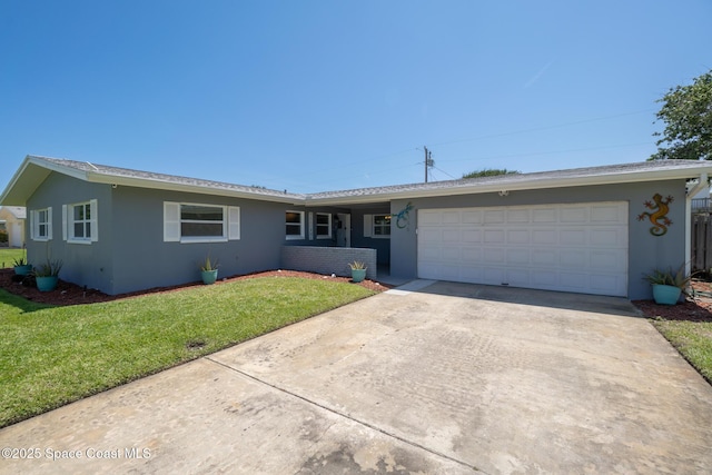 346 Cyprus Dr, Cocoa Beach, FL 32931 - ranch-style house with stucco siding, an attached garage, driveway, and a front lawn