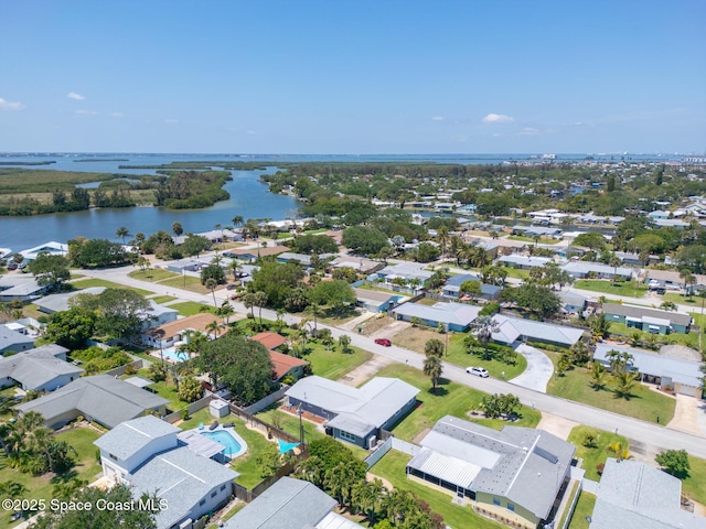 346 Cyprus Dr, Cocoa Beach, FL 32931 - aerial perspective of suburban area featuring a nearby body of water