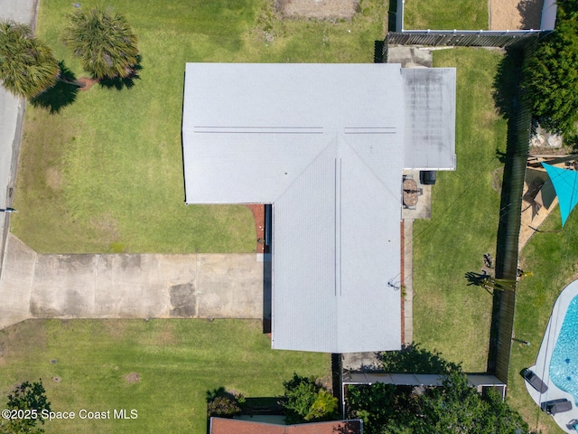 346 Cyprus Dr, Cocoa Beach, FL 32931 - view from above of property with a pool area