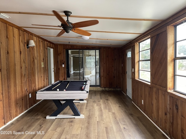 rec room featuring wooden walls and pool table