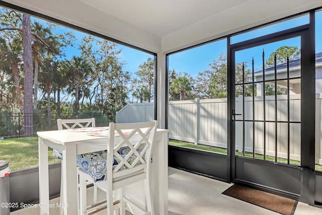 sunroom featuring plenty of natural light