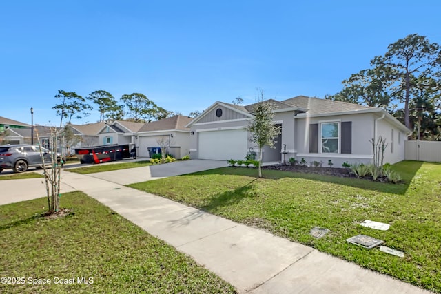 single story home featuring a front lawn and a garage