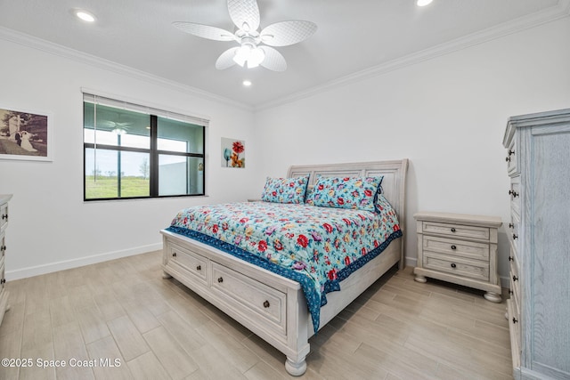 bedroom with ceiling fan and ornamental molding