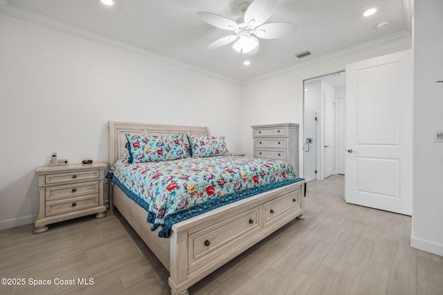 bedroom featuring ceiling fan and ornamental molding