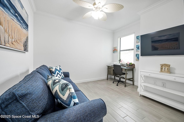 living room with ceiling fan, crown molding, and light hardwood / wood-style floors