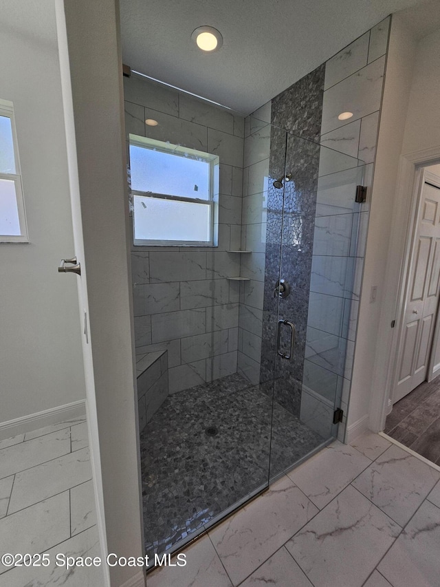 bathroom with walk in shower