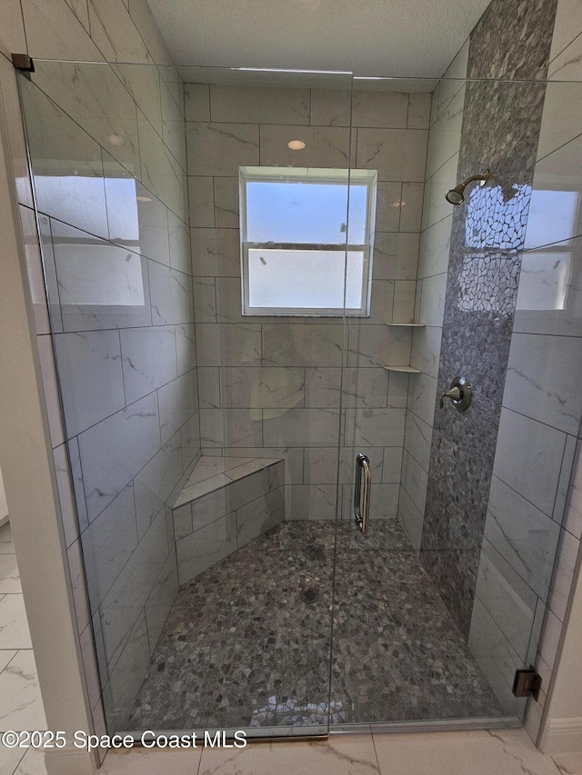 bathroom with an enclosed shower