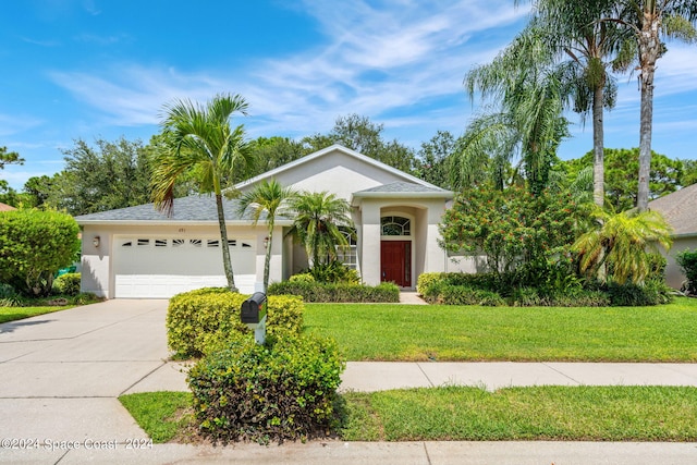 ranch-style house with a front lawn and a garage