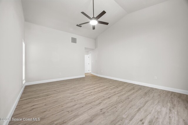 unfurnished room with ceiling fan, light hardwood / wood-style flooring, and high vaulted ceiling