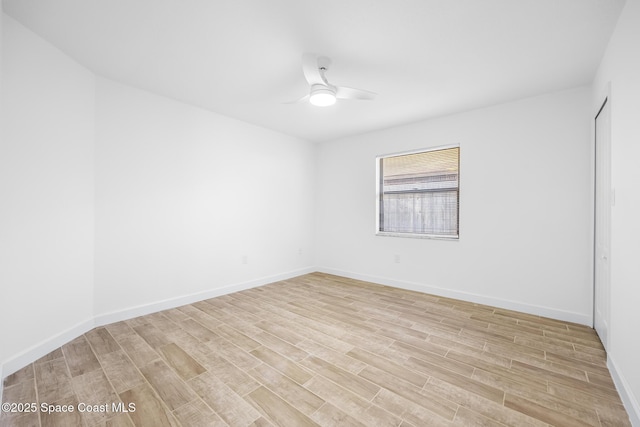 unfurnished room featuring ceiling fan and light hardwood / wood-style floors