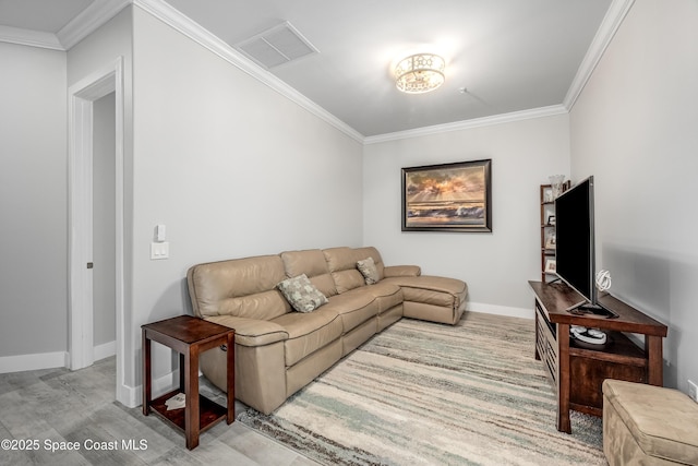 living room with ornamental molding