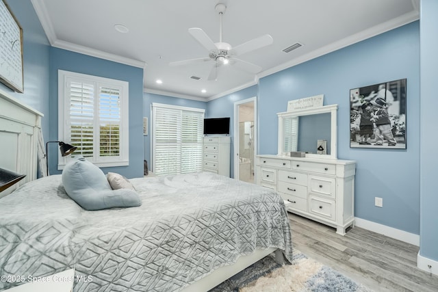 bedroom featuring light wood-type flooring, ensuite bathroom, ceiling fan, and ornamental molding