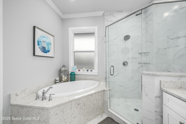 bathroom featuring vanity, crown molding, and independent shower and bath