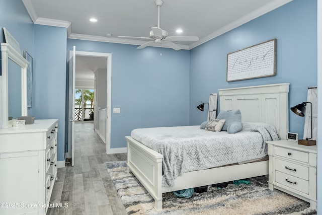 bedroom with light hardwood / wood-style flooring, ceiling fan, and crown molding