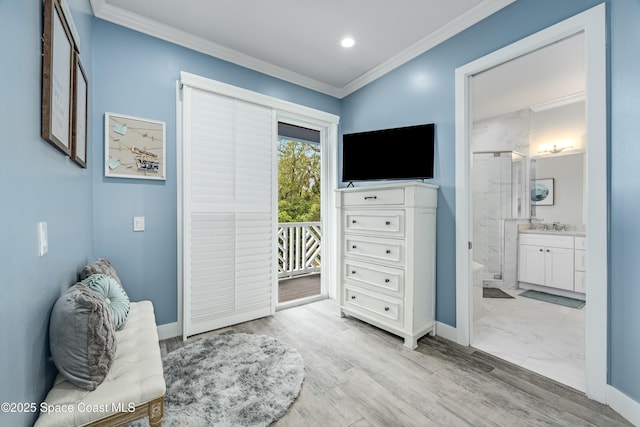 living area with crown molding