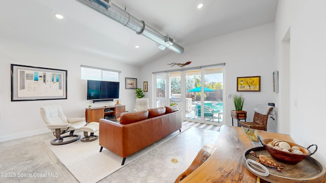 living room featuring lofted ceiling