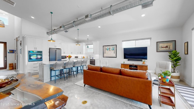 living room with lofted ceiling