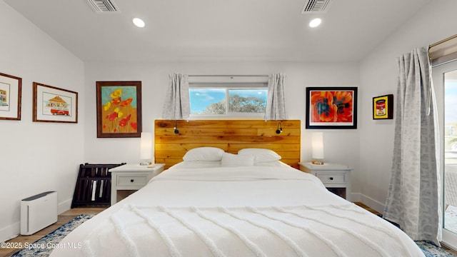 bedroom featuring hardwood / wood-style flooring