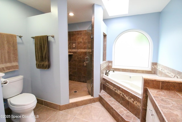 bathroom featuring tile patterned flooring, independent shower and bath, and toilet