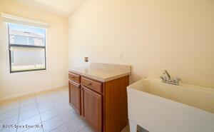 interior space with light tile patterned floors