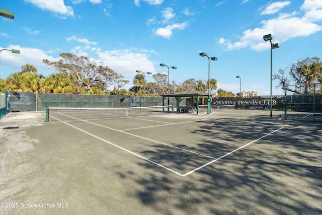 view of tennis court featuring a gazebo