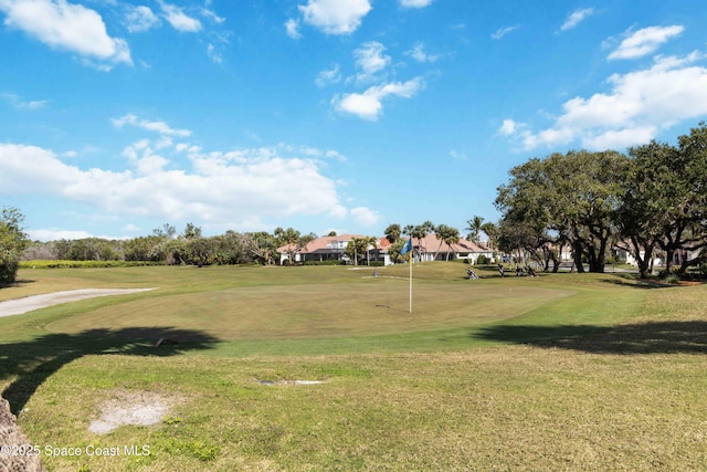 surrounding community featuring a lawn