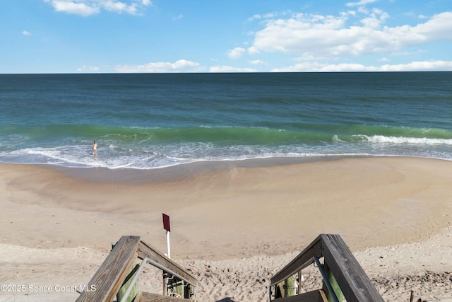 property view of water featuring a view of the beach