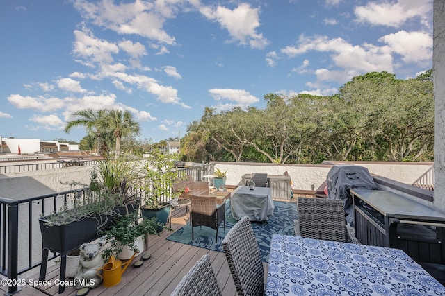 deck featuring outdoor lounge area