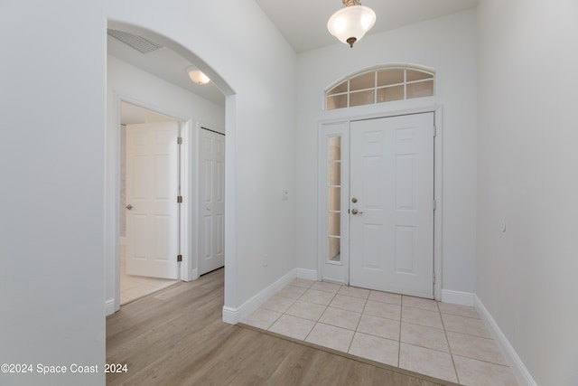 foyer entrance featuring light wood-type flooring