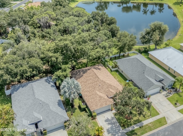 bird's eye view with a water view