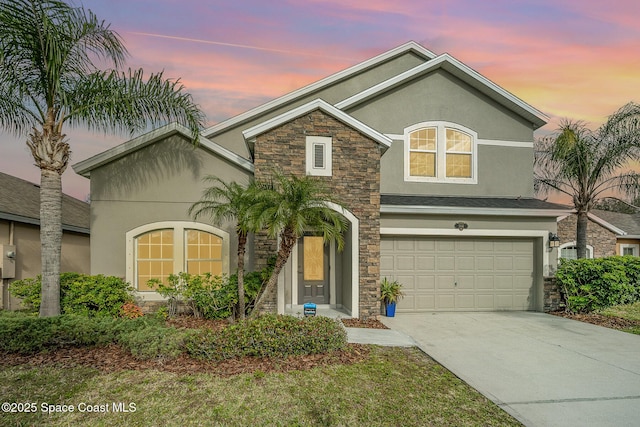 view of front of home with a garage