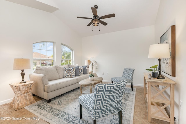 living room with high vaulted ceiling, ceiling fan, and light tile patterned floors