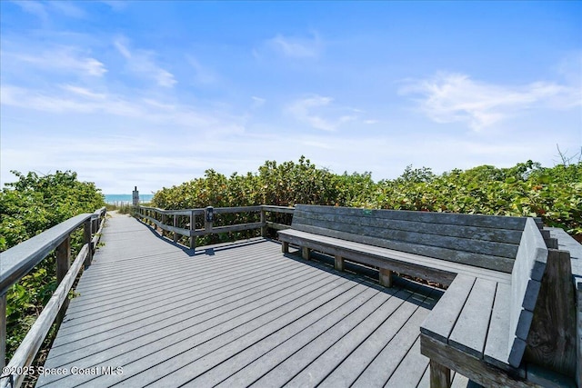 deck featuring a water view