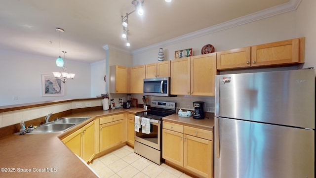 kitchen with light brown cabinets, sink, appliances with stainless steel finishes, and a chandelier