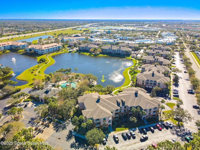 drone / aerial view featuring a water view