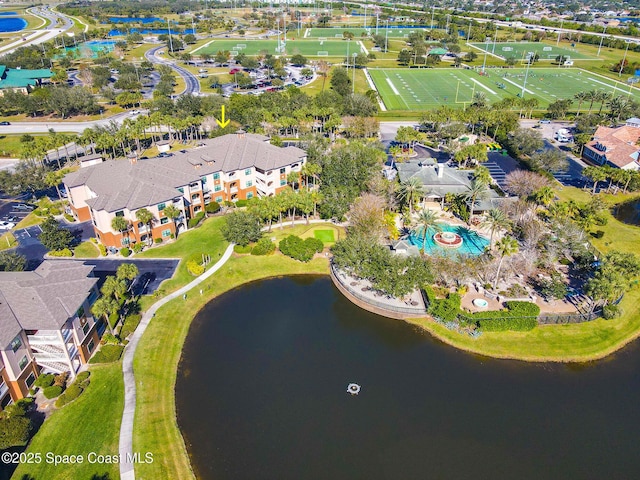 drone / aerial view with a water view